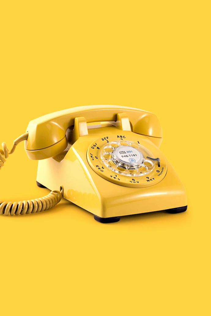yellow rotary telephone